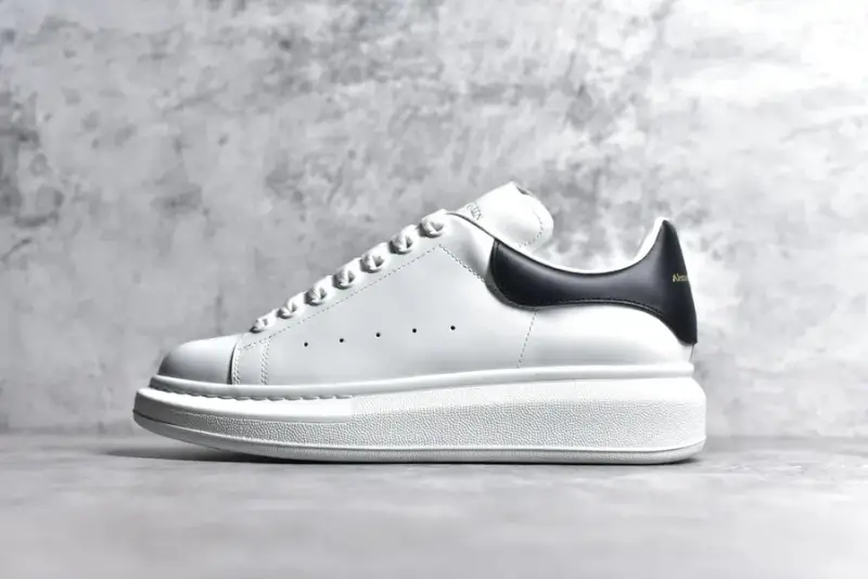 Alexander McQueen Trainers — Black Tail Gold colorway — Kakobuy Spreadsheet photo
