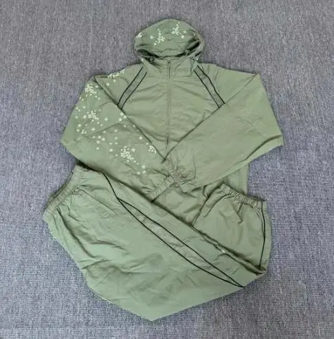 Supreme SS22 Week 3 AOI Glow-in-the-Dark Track Pants — green suit colorway — USFans Spreadsheet photo