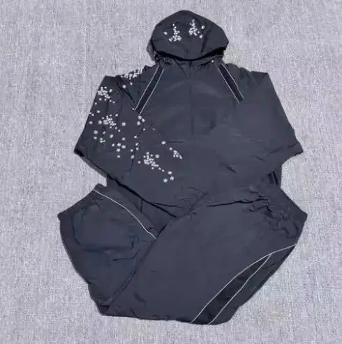Supreme SS22 Week 3 AOI Glow-in-the-Dark Track Pants — black suit colorway — USFans Spreadsheet photo