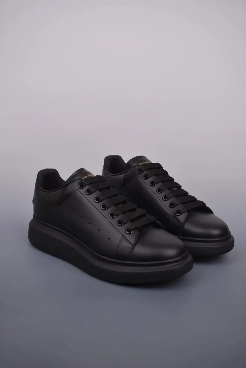 Alexander McQueen Trainers — pure black gold lettering colorway — Kakobuy Spreadsheet photo